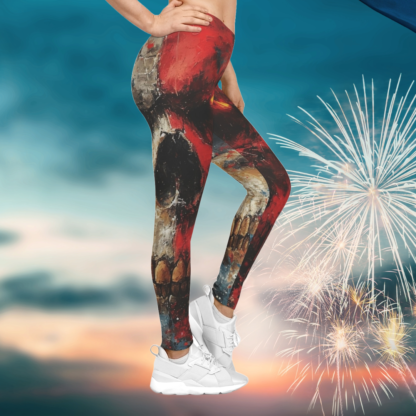 The leggings feature a striking red, white, and blue color palette, echoing the iconic hues of the American flag. The centerpiece of the design is a stylized patriotic skull adorned with stars and stripes. This edgy yet feminine motif celebrates the strength, resilience, individuality, and independence of the American woman.